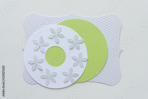 paper flower shaped confetti on fancy paper shapes photo