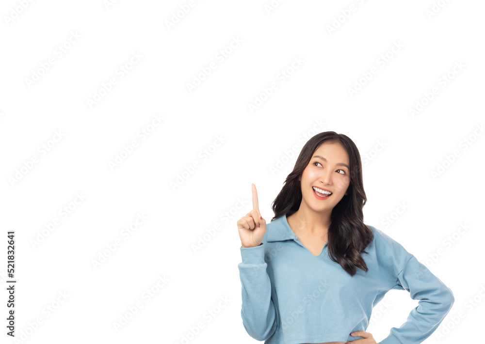 Happy young Asian woman pointing up to copy space and looking above with smile face and happy Pretty girl act like a satisfied product, use for advertising with isolated on white background