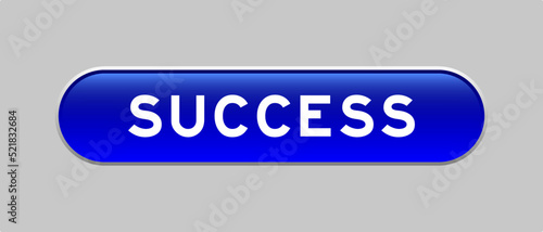 Blue color capsule shape button with word success on gray background