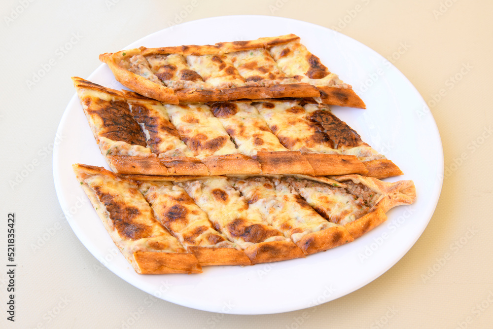 Kiymali pide. Turkish pide with minced meat. Turkish pizza mince pita Pide on white background. Etli ekmek. Kusbasi kasarli pide. Kiymali pide. Turkish pide with minced meat. Turkish pizza mince pita Pide on white background. Etli ekmek. Kusbasi kasarli pide.
