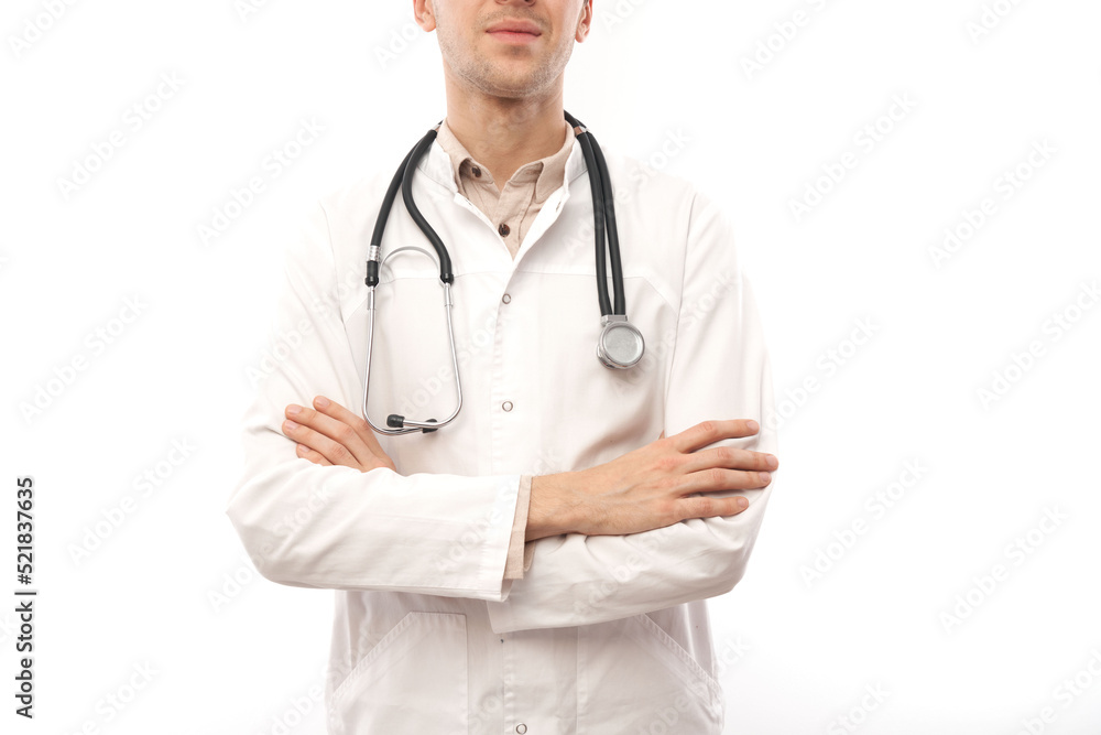 Portrait of handsome doctor in white medical coat with stethoscope on white background with copy space Portrait of handsome doctor in white medical coat with stethoscope on white background with copy space