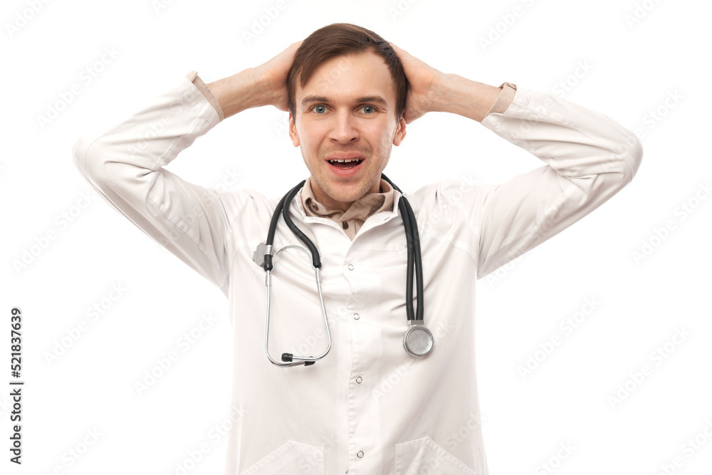 Portrait of a happy doctor in white medical coat emotionally rejoices isolated on white background with copy space Portrait of a happy doctor in white medical coat emotionally rejoices isolated on white background with copy space
