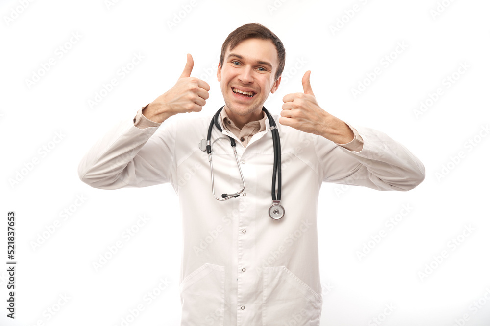 Portrait of happy doctor in white medical coat showing gesture all is well isolated on white background with copy space Portrait of happy doctor in white medical coat showing gesture all is well isolated on white background with copy space