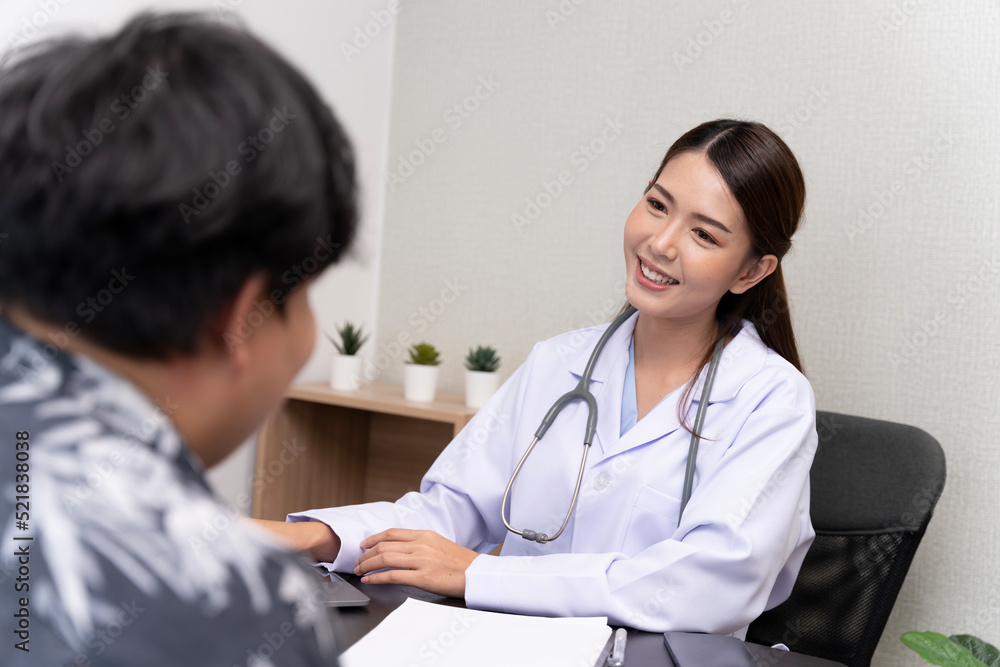 A beautiful Asian doctor discusses the condition of a male patient being hospitalized.