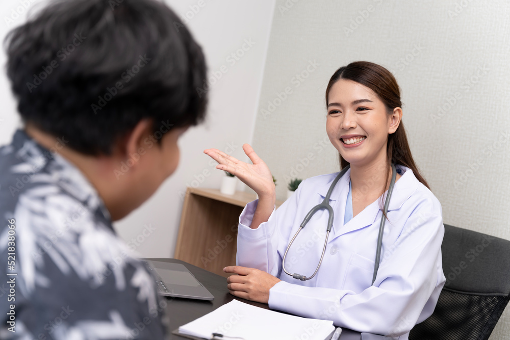A beautiful Asian doctor discusses the condition of a male patient being hospitalized. A beautiful Asian doctor discusses the condition of a male patient being hospitalized.