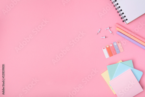 The concept of Back to school. School stationery on a pink background. Selective focus. background
