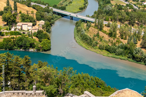 Obraz na płótnie Confluence or conflux of the river Durance and the Buëch in Sisteron, France w salonie