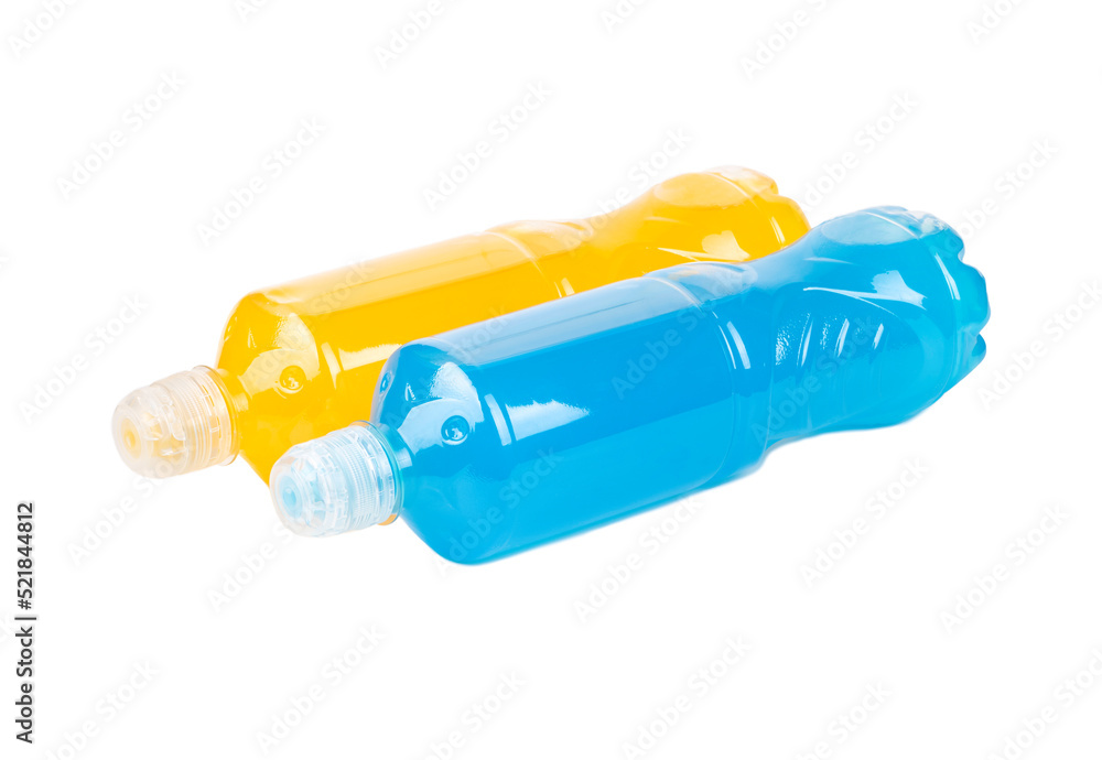 Two lying bottles of Isotonic drink for sports in blue and orange on a white background Two lying bottles of Isotonic drink for sports in blue and orange on a white background