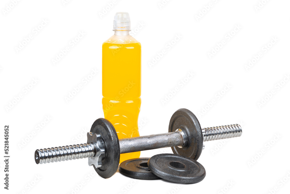 Dumbbell with pancakes and a plastic bottle of isotonic drinks with orange flavor isolated on a white background Dumbbell with pancakes and a plastic bottle of isotonic drinks with orange flavor isolated on a white background