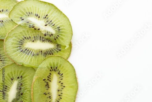 slices of kiwi on white background