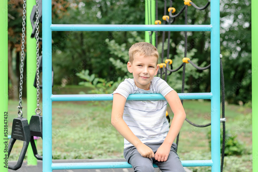 Obraz premium little boy on the playground