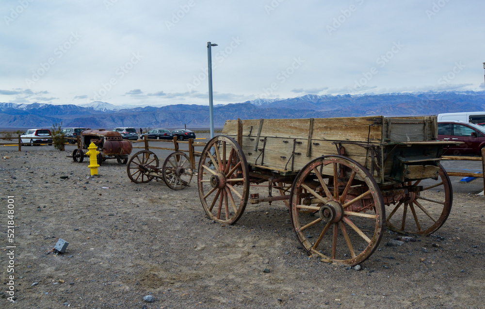 CALIFORNIA, USA - NOVEMBER 29, 2019: an old cart from the times of westernization and cowboys in the interior near a store in California