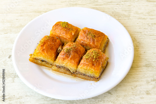 Turkish Dessert Sobiyet , havuc dilimi,  midye  Baklava, mussels baklava and classic baklava with Pistachio . Cevizli, Fistikli Baklava, top view.