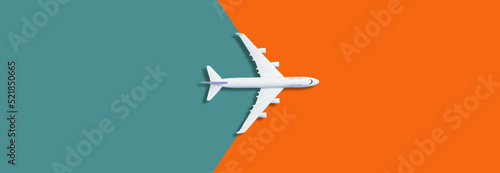 Flat lay design of travel concept with plane on orange background with copy space