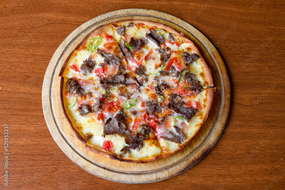 Delicious mixed pizza with rich content. Menu concept of choice and diversity. Karisik pizza Delicious mixed pizza with rich content. Menu concept of choice and diversity. Karisik pizza