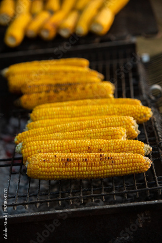 Fresh roasted or grilled corncobs. Grilled Corn for sale on the street.