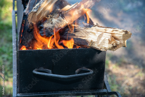coal in a  black  grill