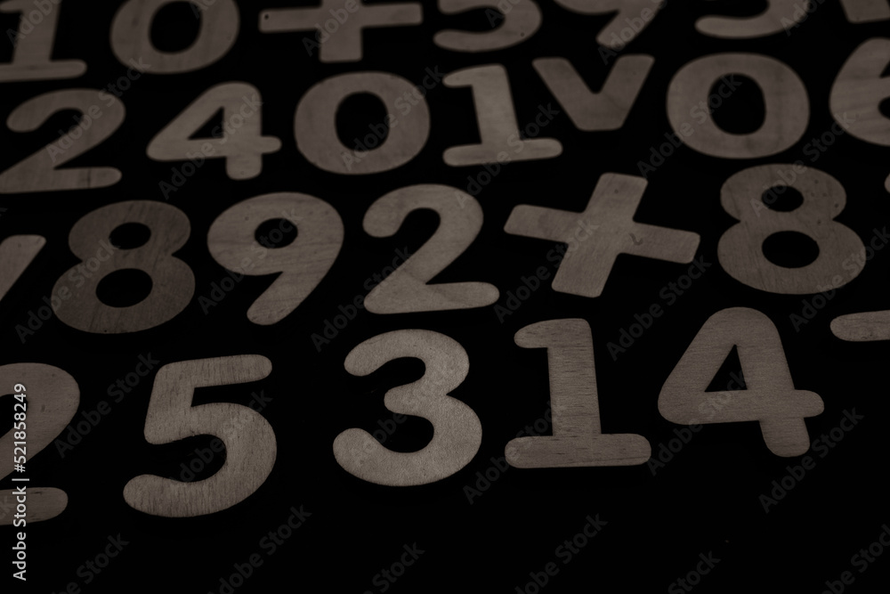 Colorful wooden colorful numbers background. Numbers texture abstraction. Global economy crisis concept 