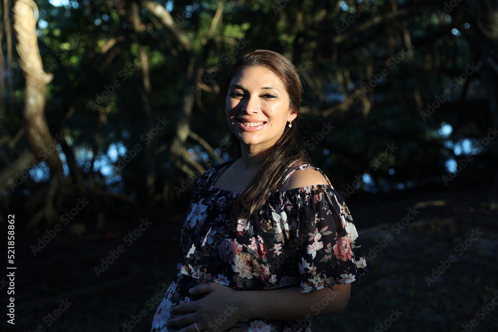 Miami, Florida / United States – December 31, 2021: Maternity Photoshoot in a Park Miami, Florida / United States – December 31, 2021: Maternity Photoshoot in a Park
