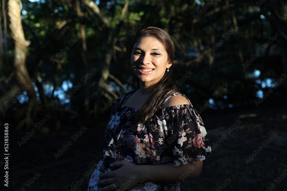 Miami, Florida / United States – December 31, 2021: Maternity Photoshoot in a Park Miami, Florida / United States – December 31, 2021: Maternity Photoshoot in a Park