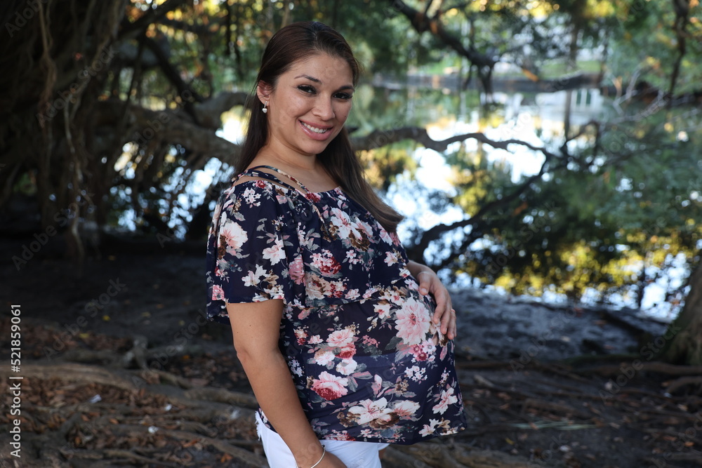 Miami, Florida / United States – December 31, 2021: Maternity Photoshoot in a Park