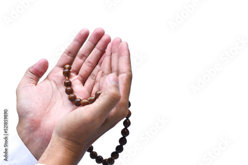 Religious muslim islam man in white session lift two hand for praying to Allah in mosque, isolated on dark background.concept for islamic pray, Ramadan, Eid al Fitr, eid ad-ha, meditation