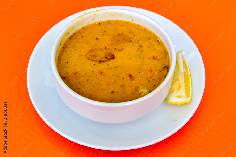 Lentil ( mercimek ) soup with melted butter and red pepper sauce. Mercimek corbasi Lentil ( mercimek ) soup with melted butter and red pepper sauce. Mercimek corbasi