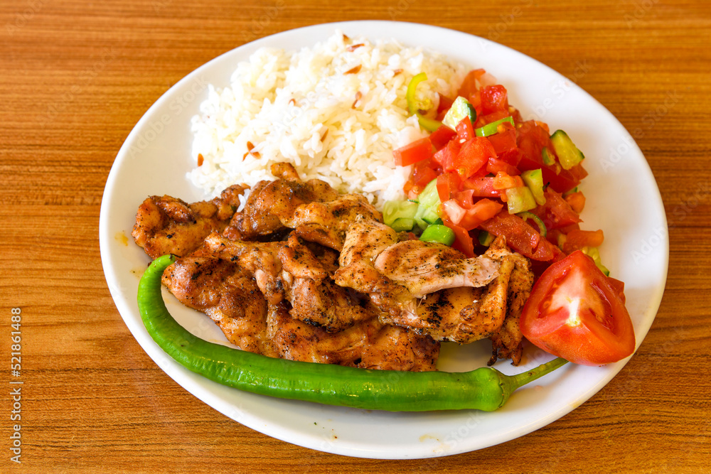 Chicken wings barbeque in a dish with BBQ sauce . Izgara tavuk sis kanat. Chicken wings barbeque in a dish with BBQ sauce . Izgara tavuk sis kanat.