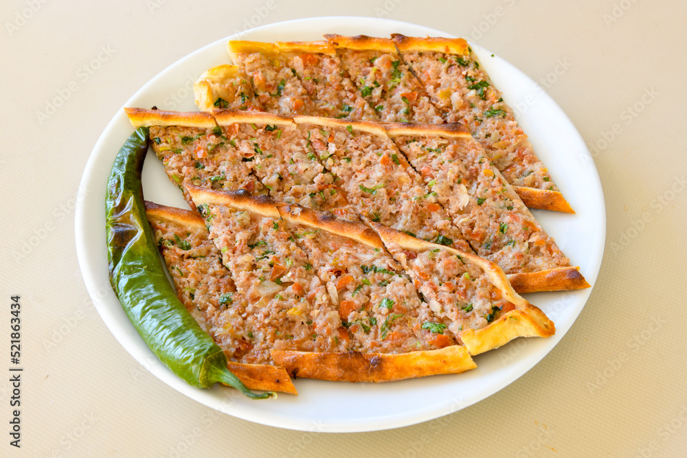 Turkish pita with minced cubed meat and cheese (Turkish name: Kiyma Kusbasi kasarli pide) Turkish pita with minced cubed meat and cheese (Turkish name: Kiyma Kusbasi kasarli pide)