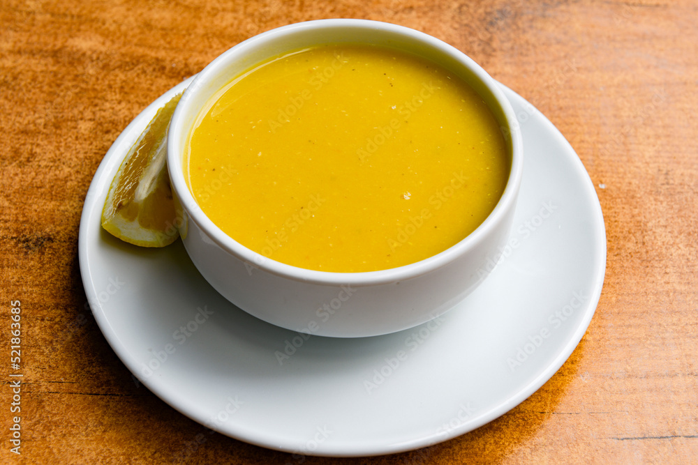 Lentil ( mercimek ) soup with melted butter and red pepper sauce. Mercimek corbasi Lentil ( mercimek ) soup with melted butter and red pepper sauce. Mercimek corbasi