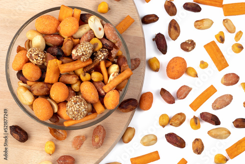 Mixed nuts and dry fruits on a white background. Top view.