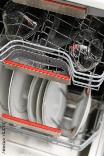 Clean dishes in the dishwasher close-up. Flat lay