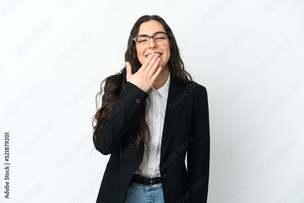 Young business woman isolated on white background happy and smiling covering mouth with hand