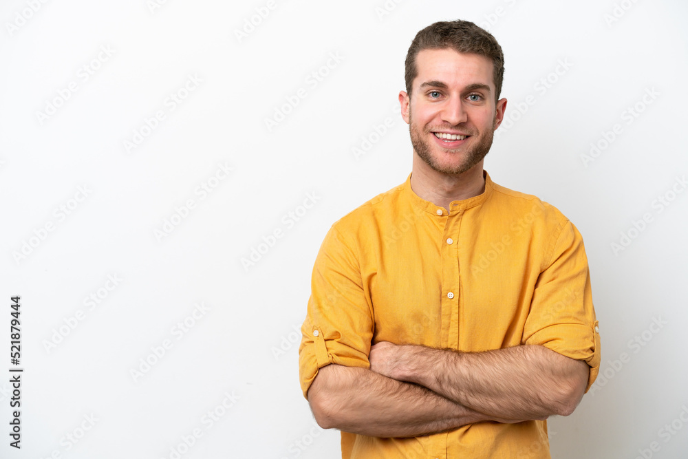 Young caucasian man isolated on white background keeping the arms crossed in frontal position Young caucasian man isolated on white background keeping the arms crossed in frontal position