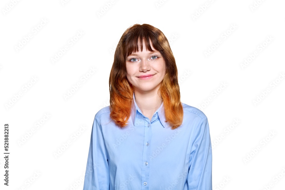 Smiling redhead teenage female on white isolated background Smiling redhead teenage female on white isolated background