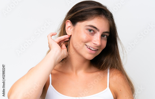 Young Pretty caucasian woman isolated on white background with happy expression. Close up portrait
