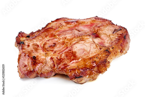 Roasted juicy pork steak, close-up, isolated on white background.