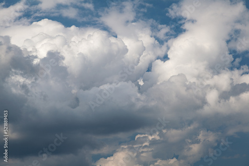 Fototapeta Naklejka Na Ścianę i Meble -  Puffy Clouds in a Blue Sky