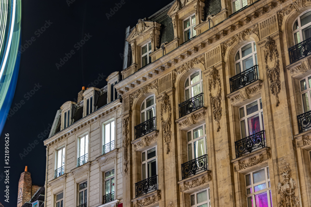 Fototapeta premium old style french town hall in european town at night with colors
