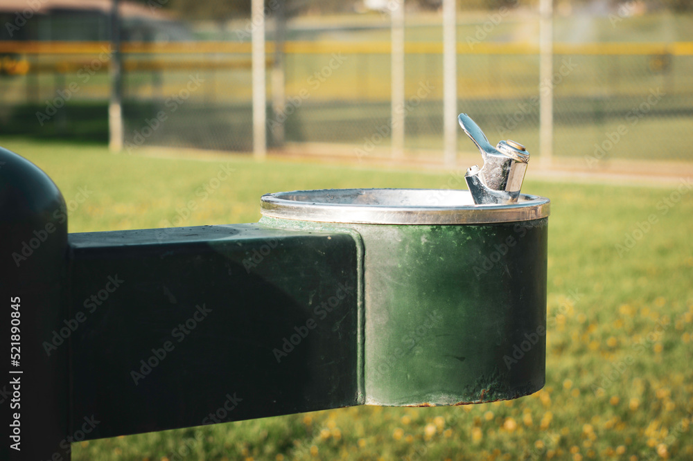Close-up of drinking fountain in public park