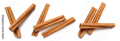 Tela Set of cinnamon sticks, isolated on white background