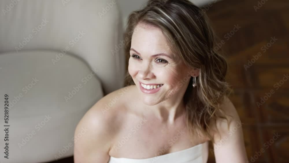 portrait of a beautiful middle-aged woman with blonde hair and open shoulders. portrait of a beautiful middle-aged woman with blonde hair and open shoulders.