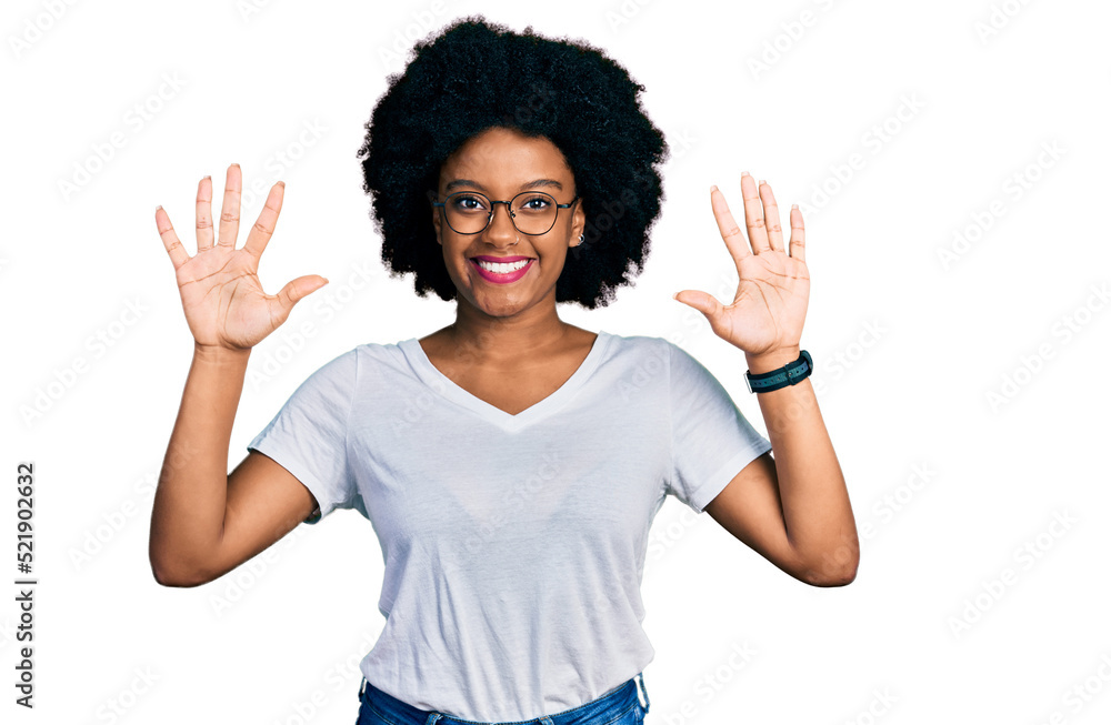 Young african american woman wearing casual white t shirt showing and pointing up with fingers number ten while smiling confident and happy. Young african american woman wearing casual white t shirt showing and pointing up with fingers number ten while smiling confident and happy.