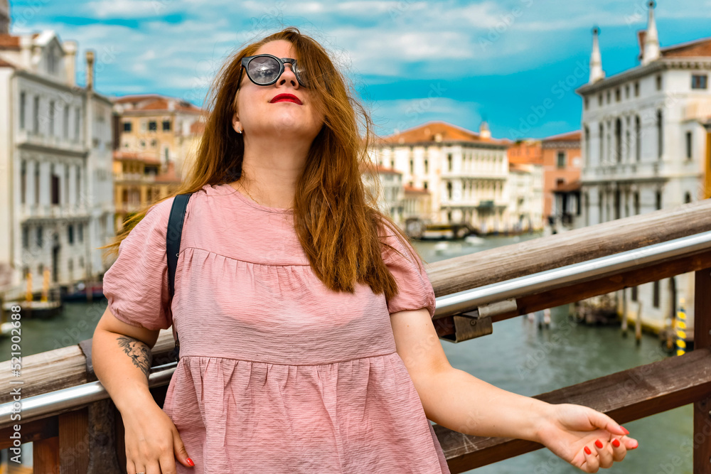 portrait woman walking in the city of Venice