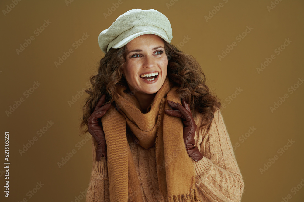 happy elegant woman in scarf isolated on brown background happy elegant woman in scarf isolated on brown background
