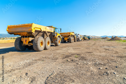 Heavy equipment sits near piles of excavated dirt at a new home subdivision being constructed near River District at a suburb of Spokane, Washington, USA.