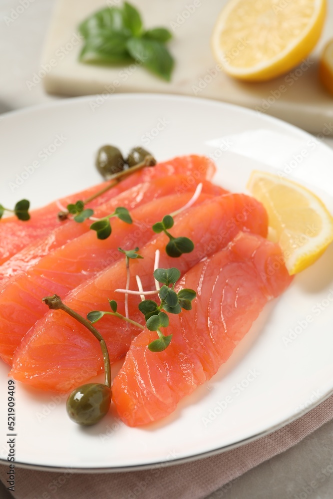 Delicious salmon carpaccio served on table, closeup