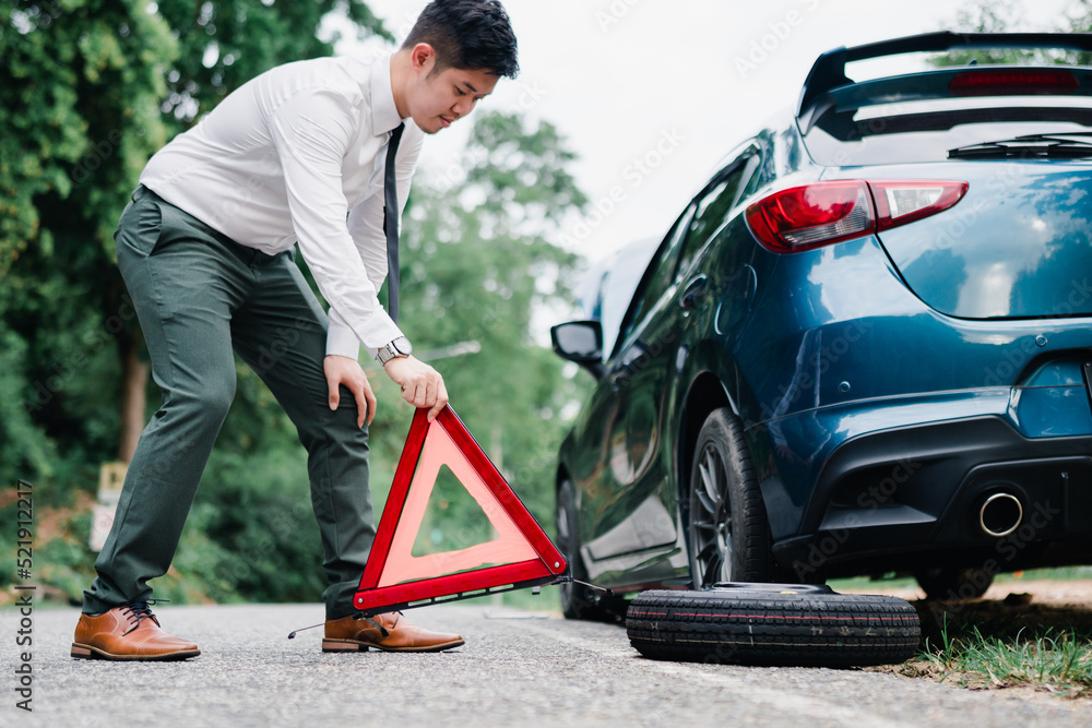 Asian businessman broken car engine breakdown his stressed problem, Accident emergency on the mountain road outdoor late for work concept. Asian businessman broken car engine breakdown his stressed problem, Accident emergency on the mountain road outdoor late for work concept.