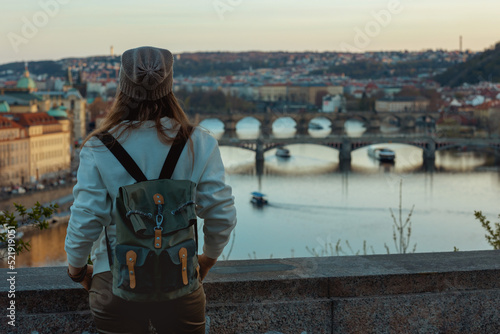 stylish woman in Prague Czech Republic exploring attractions © Alliance