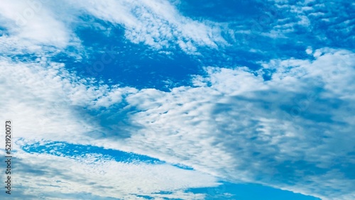 Fototapeta Naklejka Na Ścianę i Meble -  blue sky background with fluffy clouds 